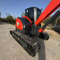2023 Yanmar VIO80 mini excavator, rear three-quarter view