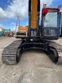 2024 Sany 215CPRO Crawler Excavator showing the front of the operator's cab and the boom base.