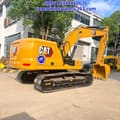 2023 Caterpillar 320GC crawler excavator, rear three-quarter view