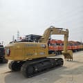 2023 Caterpillar 315D2 GC crawler excavator, rear three-quarter view