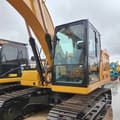 Caterpillar 320GC crawler excavator, side view of cab and boom