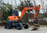2017 Doosan DX57W wheel excavator, side view