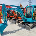 2023 Kubota U25 mini excavator, front three-quarter view