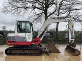 2015 Takeuchi TB250 mini excavator side view