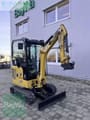 2022 Caterpillar 301.8 mini excavator, front three-quarter view
