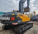 2022 Hyundai 225LVS crawler excavator, rear three-quarter view