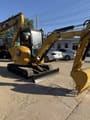 2021 Caterpillar 303.5E mini excavator, front three-quarter view