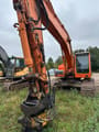 2009 Doosan DX255LC crawler excavator, front three-quarter view