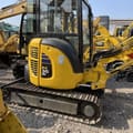 Komatsu PC30MR mini excavator, side view