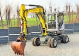 2011 Wacker Neuson 6503 wheel excavator, front three-quarter view