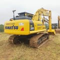 Excavadora de orugas Komatsu PC200-8 2024, vista trasera tres cuartos