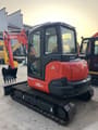 2022 Kubota U55-4 mini excavator, front three-quarter view