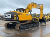 2025 JCB 205 Crawler Excavator showing the left side with the engine compartment and tracks.