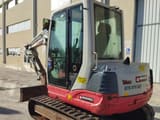 2017 Takeuchi TB250 mini excavator, rear three-quarter view