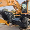 2025 Hyundai R210W-9 wheel excavator front three-quarter view