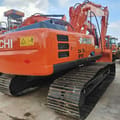 2023 Hitachi ZAXIS 210 crawler excavator rear three-quarter view