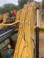 2018 Caterpillar 329D crawler excavator boom and hydraulic lines view