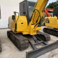 2023 Komatsu PC56-7 mini excavator, rear three-quarter view