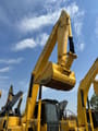 2024 Komatsu PC350-7 crawler excavator, front view of boom and bucket