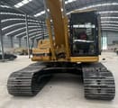 Caterpillar 320BL crawler excavator, rear view