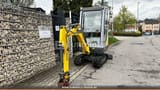 2015 Wacker Neuson 1404 mini excavator, front three-quarter view
