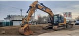 2014 Caterpillar 323EL crawler excavator, side view