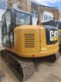 Caterpillar 308E crawler excavator, rear three-quarter view