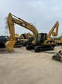 Koparka gąsienicowa Caterpillar 320C 2024, widok z boku