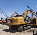 2020 Caterpillar 320DL crawler excavator, rear three-quarter view