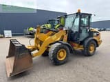 2015 Caterpillar 906M wheel loader, front three-quarter view