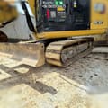 2022 Caterpillar 305.5E2 mini excavator side view