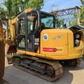 2022 Caterpillar 307E2 excavator, rear three-quarter view