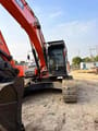 2024 Doosan DX300 crawler excavator, rear three-quarter view