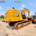 2022 Caterpillar 352 crawler excavator rear three-quarter view
