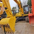 2025 Komatsu PC210LC-7 crawler excavator, front three-quarter view