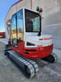 2018 Takeuchi TB260 mini excavator, rear three-quarter view