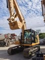 2022 Caterpillar 320GC crawler excavator, front three-quarter view