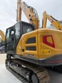 2026 XCMG XE135GA crawler excavator, rear three-quarter view