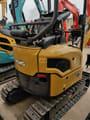 2026 XCMG XE17U Mini Excavator with a close-up of the rear engine cover and side panel.