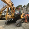 2023 Caterpillar 320C crawler excavator, front three-quarter view