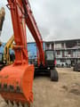 2016 Hitachi ZX200-5G crawler excavator, front view with bucket