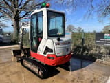 2020 Takeuchi TB225 mini excavator, rear three-quarter view