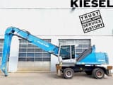 2015 Fuchs MHL340 E material handler, side profile view