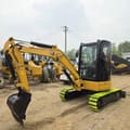 2023 Caterpillar 303.5E mini excavator, side view