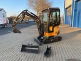 2026 Berger Kraus BK2000NKSR Mini Excavator with an orange body, black boom, and a visible BK2000NKSR model decal on the side.