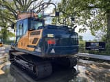 2021 Hyundai HX140LC crawler excavator rear three-quarter view