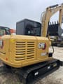 2023 Caterpillar 306E2 mini excavator rear three-quarter view