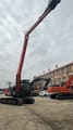 2018 Doosan DX140LC crawler excavator with long-reach boom, side view
