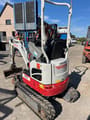 2023 Takeuchi TB210R mini excavator, rear three-quarter view