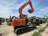 2023 Hitachi Zaxis 70 crawler excavator, rear three-quarter view
